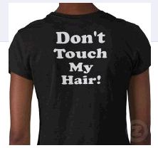 Trying to Put a T-Shirt On Without Messing Up Your Hair